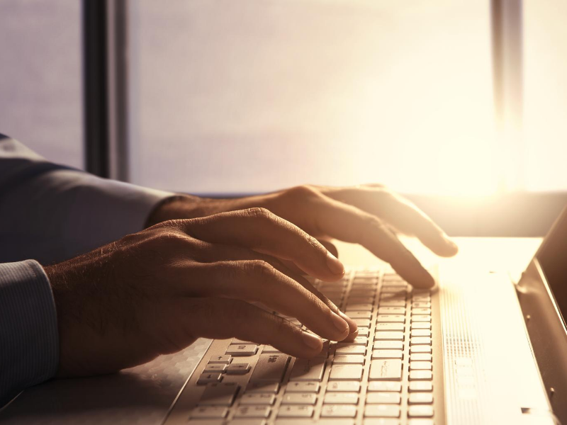 Hands on a keyboard.